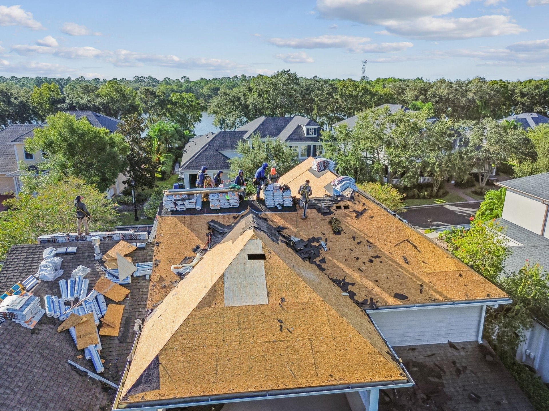 Roofing crew working on a Tampa home roof replacement